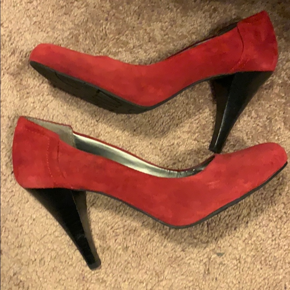 Red suede pumps